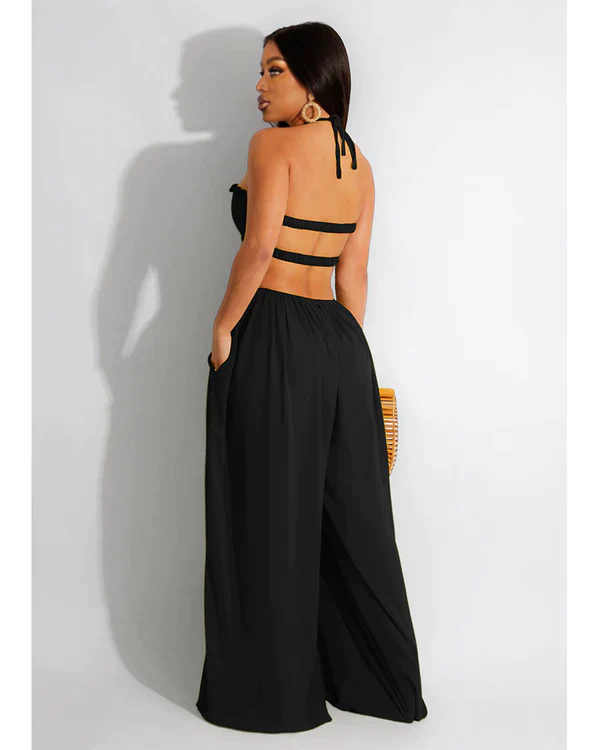 SMOCKED HALTER TOP WIDE LEG JUMPSUIT