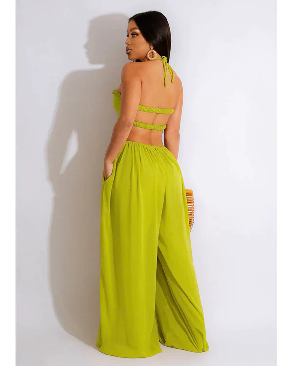 SMOCKED HALTER TOP WIDE LEG JUMPSUIT